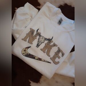 Western “NIKE” Graphic Sweatshirt
Simple. Bold. Ranch soul. Unisex fit